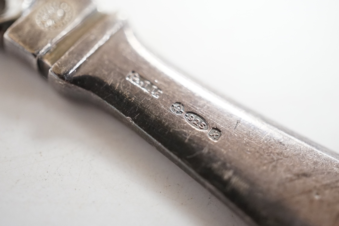 A 1960's Georg Jensen silver paperknife, design no.198, 11.5cm, with dolphin finial.